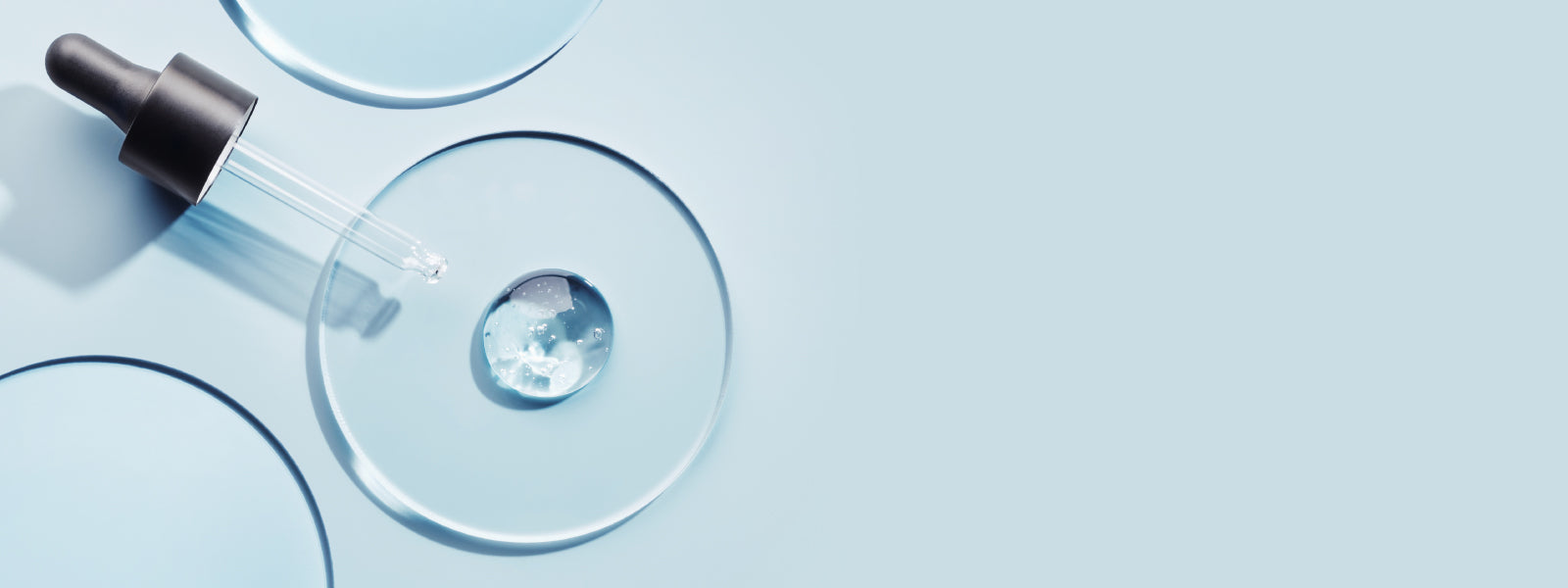 A close-up of a bottle with a dropper, used for precise dispensing of liquids.